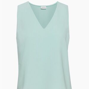 large aritzia babaton blouse in limited edition color aquamarine. new with tags